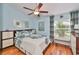 Light and airy bedroom with hardwood floors and built-in storage at 2447 Nantucket Harbor Loop # 112, Sun City Center, FL 33573