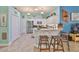 Modern kitchen with stainless steel appliances and granite countertops, offering ample cabinet space at 2447 Nantucket Harbor Loop # 112, Sun City Center, FL 33573