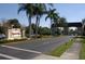 Kings Point community entrance with gated access and landscaping at 2447 Nantucket Harbor Loop # 112, Sun City Center, FL 33573
