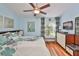 Spacious bedroom with hardwood floors and a window seat at 2447 Nantucket Harbor Loop # 112, Sun City Center, FL 33573
