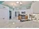 Updated kitchen featuring stainless steel appliances, granite countertops, and stylish cabinetry at 2447 Nantucket Harbor Loop # 112, Sun City Center, FL 33573