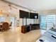 Open living room with view into kitchen and dining area at 35801 Verda Dr, Zephyrhills, FL 33541