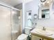 Clean bathroom with a shower/tub combo and updated vanity at 35801 Verda Dr, Zephyrhills, FL 33541