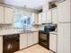 Clean kitchen with ample counter space and cabinets at 35801 Verda Dr, Zephyrhills, FL 33541