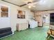 Convenient laundry room with washer, dryer, and extra storage at 35801 Verda Dr, Zephyrhills, FL 33541
