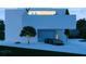 Contemporary home with minimalist design and attached garage at 100 Shore Dr, Tarpon Springs, FL 34689