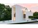 Contemporary home with minimalist design and attached garage at 100 Shore Dr, Tarpon Springs, FL 34689