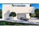 Sleek, modern home with attached garage and landscaped yard at 100 Shore Dr, Tarpon Springs, FL 34689