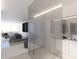 Modern bedroom with ensuite bathroom and ocean views at 100 Shore Dr, Tarpon Springs, FL 34689