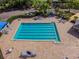 Community pool with lounge chairs and patio area at 6527 Stonington Dr, Tampa, FL 33647