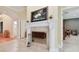 Beautiful fireplace with white columns and decorative mantle in the living area at 6527 Stonington Dr, Tampa, FL 33647