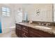 Bathroom with granite double vanity and a bathtub shower combo at 6527 Stonington Dr, Tampa, FL 33647