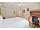 Spacious bedroom with wood floors, built-in desk, and large closet at 6527 Stonington Dr, Tampa, FL 33647
