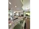 Open concept kitchen and Gathering room with granite countertops at 12384 Creek Edge Dr, Riverview, FL 33579