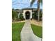 Front entry with double doors and walkway at 12384 Creek Edge Dr, Riverview, FL 33579
