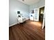 Bright home office with hardwood floors and built-in shelving at 12384 Creek Edge Dr, Riverview, FL 33579