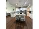 Modern kitchen with granite countertops, stainless steel appliances, and an island at 12384 Creek Edge Dr, Riverview, FL 33579