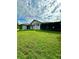 Home with large backyard and screened patio at 12384 Creek Edge Dr, Riverview, FL 33579
