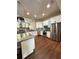 Modern kitchen with granite countertops and stainless steel appliances at 12384 Creek Edge Dr, Riverview, FL 33579