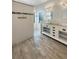 Spa-like bathroom featuring double vanity, white subway tile, and walk-in shower at 18122 Sugar Brooke Dr, Tampa, FL 33647