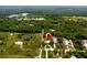 Aerial view showing home's location in a wooded area at 29249 Wilpayne Rd, Brooksville, FL 34602