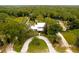 Aerial view of a house with a pool and large yard at 29249 Wilpayne Rd, Brooksville, FL 34602