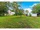 Spacious backyard with shed, mature trees, and plenty of green space at 29249 Wilpayne Rd, Brooksville, FL 34602