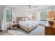 Spacious bedroom with a king-size bed and ample natural light at 29249 Wilpayne Rd, Brooksville, FL 34602