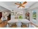 Open concept dining room with hardwood floors and view into living room at 29249 Wilpayne Rd, Brooksville, FL 34602