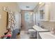 Clean bathroom with double sinks, shower, and updated fixtures at 29249 Wilpayne Rd, Brooksville, FL 34602