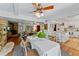 Open concept dining room with hardwood floors and view of kitchen at 29249 Wilpayne Rd, Brooksville, FL 34602