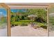 Private backyard with patio and lush landscaping at 29249 Wilpayne Rd, Brooksville, FL 34602