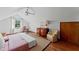 Bright bedroom featuring hardwood floors and ample closet space at 29249 Wilpayne Rd, Brooksville, FL 34602