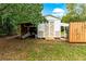 Functional shed with covered workspace and outdoor seating area at 29249 Wilpayne Rd, Brooksville, FL 34602