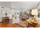 Cozy living room with hardwood floors and fireplace at 29249 Wilpayne Rd, Brooksville, FL 34602