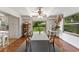 Bright dining room with hardwood floors and view of backyard at 29249 Wilpayne Rd, Brooksville, FL 34602