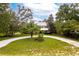 Charming farmhouse on a spacious lot with a circular driveway at 29249 Wilpayne Rd, Brooksville, FL 34602