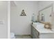 Clean bathroom, featuring a pedestal sink and tiled floor at 29249 Wilpayne Rd, Brooksville, FL 34602