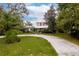 Beautiful farmhouse with a large yard and circular driveway at 29249 Wilpayne Rd, Brooksville, FL 34602