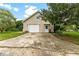 Detached garage with double doors and a separate entrance at 29249 Wilpayne Rd, Brooksville, FL 34602