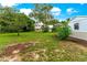 Large grassy backyard offering plenty of space for outdoor activities at 29249 Wilpayne Rd, Brooksville, FL 34602