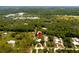 Aerial view showing home's location in wooded area at 29249 Wilpayne Rd, Brooksville, FL 34602