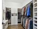 Large walk-in closet with ample shelving and hanging space at 807 W Kentucky Ave, Tampa, FL 33603