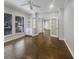 Spacious office with built-in shelving, hardwood floors and French doors at 18122 Sugar Brooke Dr, Tampa, FL 33647