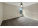 Bright bedroom featuring carpet and a ceiling fan at 18122 Sugar Brooke Dr, Tampa, FL 33647