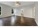 Bright bedroom with hardwood floors and access to bathroom at 18122 Sugar Brooke Dr, Tampa, FL 33647