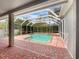 Relaxing screened pool and spa area at 18122 Sugar Brooke Dr, Tampa, FL 33647
