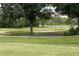 Scenic view of lush green golf course fairways and water features at 13102 Prestwick Dr, Riverview, FL 33579