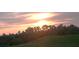 Breathtaking sunset view over the serene landscape, showcasing nature's beauty and tranquility at 13102 Prestwick Dr, Riverview, FL 33579