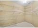 Spacious walk-in closet with multiple levels of wire shelving for organized storage at 13102 Prestwick Dr, Riverview, FL 33579